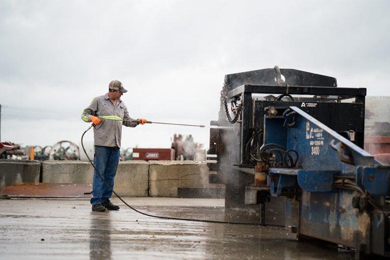 Midwest Mole employees working on the field