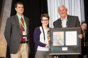 Tom Hayes of Murphy Pipeline Contractors (right) accepted the 2014 Trenchless Technology Project of the Year award from Trenchless Technology editors Jim Rush and Sharon M. Bueno.